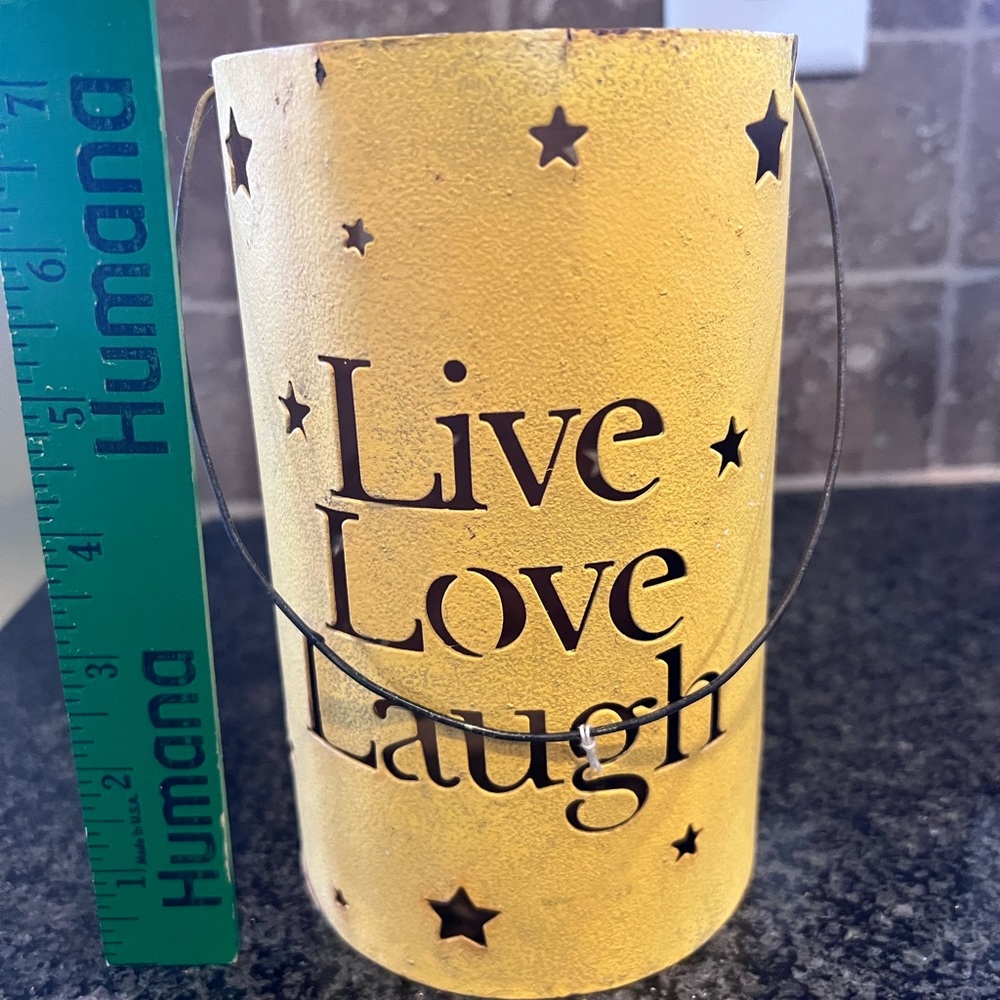 Metal cut out luminary ready for you to place a candle in.